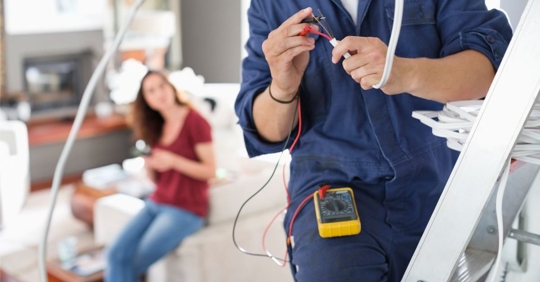Woman and electrician.